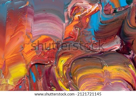 Mixed oil paints close-up. Colorful abstract background