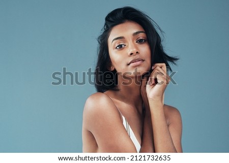 Her beauty makes it hard not to stare Royalty-Free Stock Photo #2121732635