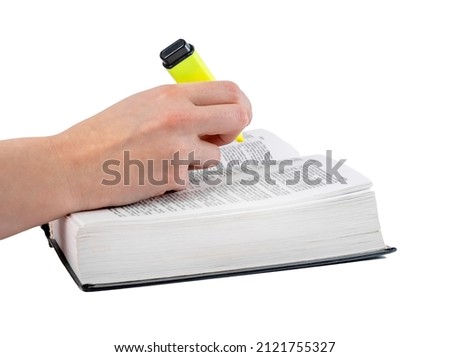 Book highlight. Hand underlining important text in book isolated on white background. Education, information analysis concept. High quality photo