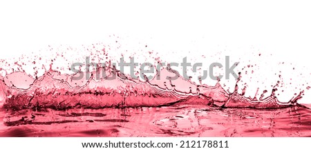 splashing red wine on white background