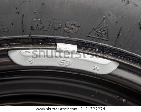 Counterweight Vehicle wheels. Car repair. Royalty-Free Stock Photo #2121792974