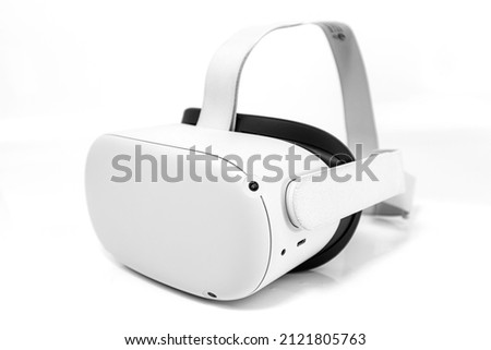 Virtual reality VR glasses on white background. VR helmet or virtual reality glasses on isolated background.  Royalty-Free Stock Photo #2121805763