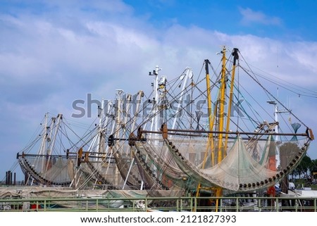 View of the nets of shrimp cutters in the port of Fedderwardersiel - Germany 