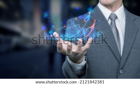 Concept of interest rates and dividends provision of financial services. Show growth graph in hand Royalty-Free Stock Photo #2121842381