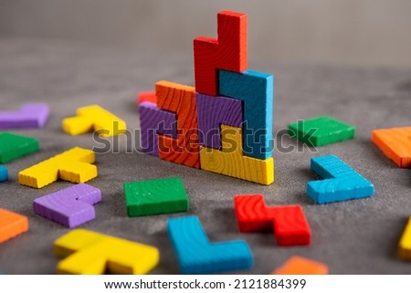 Creative idea solution - business concept, jigsaw puzzle close up. Leadership and teamwork strategy success. Royalty-Free Stock Photo #2121884399