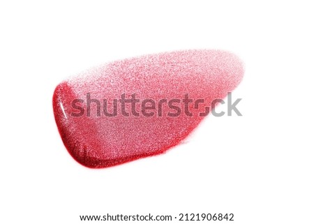 Beauty swatches. Lipsticks smear, palette of smudged lipsticks isolated on white background. Bright red color of cosmetic product smear sample