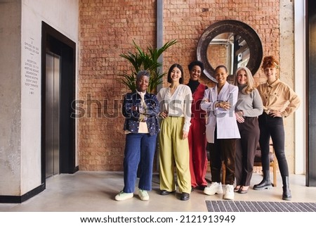 International Women's Day portrait of united multi ethnic mixed age range women in business, Embrace Equity Royalty-Free Stock Photo #2121913949