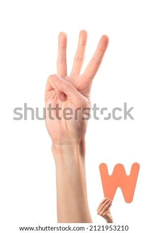 Alphabet - letter W spelling by woman's hand in American Sign Language (ASL) on white background