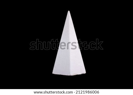 white gypsum cone isolated on a black background. High quality photo