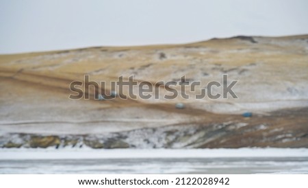 Blur picture background of snow mountain during winter season at Russia,  Europe. 