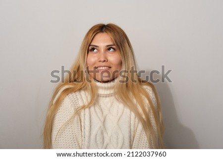 Asian woman on a gray background