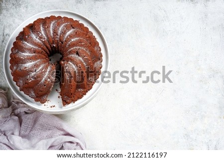 chocolate cake on white background, from top view with copy space 