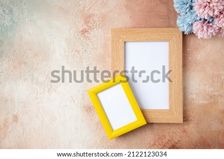 top view picture frame with flowers on light background gift present valentines day marriage couple love feeling