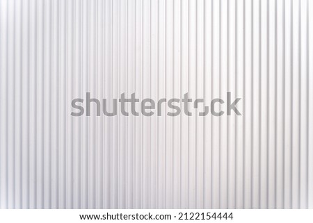 White plastic surface texture with vertical lines Royalty-Free Stock Photo #2122154444