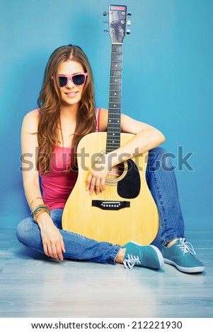 60s style photo of young hippIe woman . musician girl