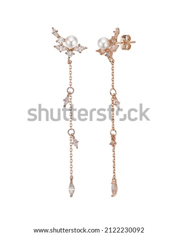 Women gold drop earrings on a white background