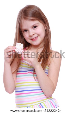 Beautiful caucasian little girl wearing pink swimsuit holding sea shell isolated over white background