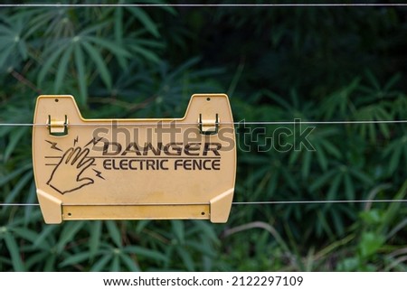 danger sign on electric fence