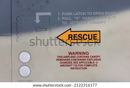 Rescue warning sign on fuselage of modern jet fighter. Royalty-Free Stock Photo #2122316177
