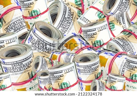 Piles of rolled up US dollar banknotes. For business and financial concept. Money dollar background.