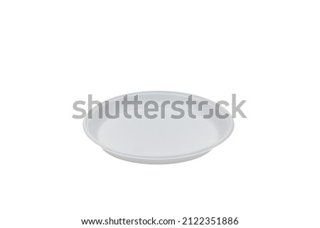 White flat plastic plate on a white background