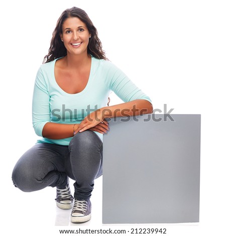 Young Smiling female Holding empty billboard