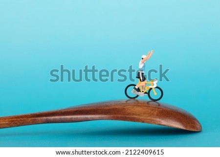 Miniature model of a ride on a wooden spoon