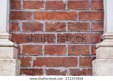 Old grunge brick wall with pilars  background