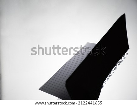 Silhouette image of a open book