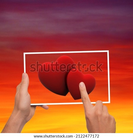 close up hand have a picture of hearts with beautiful background