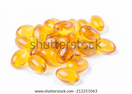 Rice bran and germ oil capsule Royalty-Free Stock Photo #212251063