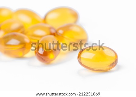 Rice bran and germ oil capsule Royalty-Free Stock Photo #212251069