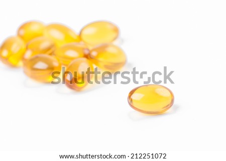 Rice bran and germ oil capsule Royalty-Free Stock Photo #212251072
