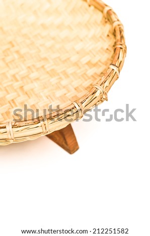Thai woven bamboo tray on white background
