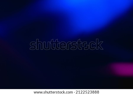Neon background. Blur color light. Fluorescent lens flare. Defocused blue pink uv led glow smooth pattern on dark night black abstract overlay mask. Royalty-Free Stock Photo #2122523888