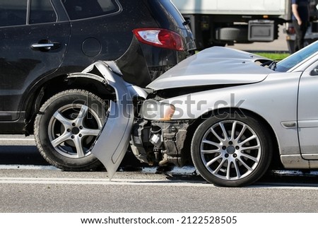 Two cars involved in a collision or crash Royalty-Free Stock Photo #2122528505