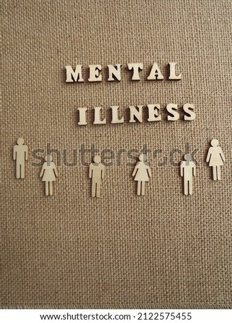 mental illness wooden letters and figurines of men and women. High quality photo