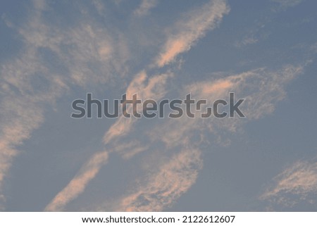 cloudy sky.Peaceful sky at dusk with light clouds, as a nature background
