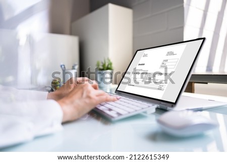 Digital Electronic Bill And Accountant E Invoice On Laptop Royalty-Free Stock Photo #2122615349