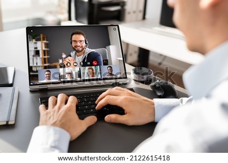 Virtual Conference Call On Hybrid Business Laptop Royalty-Free Stock Photo #2122615418