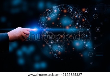 Digital communication and virtual screen metaverse technology concept WEB 3.0.hand touch globe internet. Royalty-Free Stock Photo #2122625327
