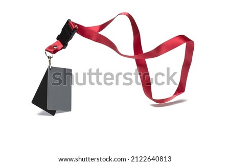 Close up of lanyard on red ribbon with gray and black card to create correct white balance for photographers on white background during professional photo shoots