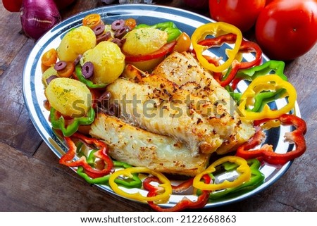 Cod with eggs olives and vegetables