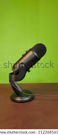 close-up picture of mic, sound recorder.