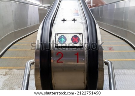 the direction indicator of the escalator. High quality photo