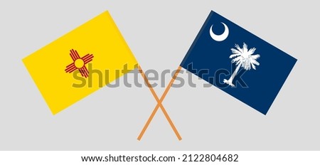 Crossed flags of the State of New Mexico and The State of South Carolina. Official colors. Correct proportion. Vector illustration
