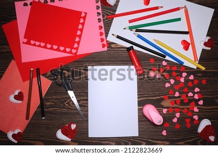 Step by step instructions. How to make a paper heart tree card. Creative crafts for valentine's day. Step 1. You will need colored paper, cardboard, a heart-shaped hole punch, felt-tip pens and glue