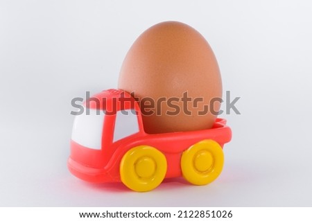 Toy truck transporting an egg