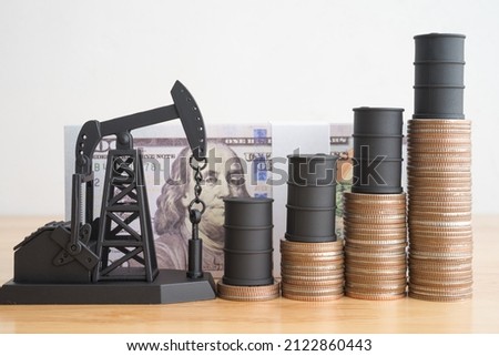 Crude oil prices increased as growing economy resulted in global petroleum demand rising faster than petroleum supply. Concept of crude oil production, petroleum industry or petrodollar, world economy Royalty-Free Stock Photo #2122860443