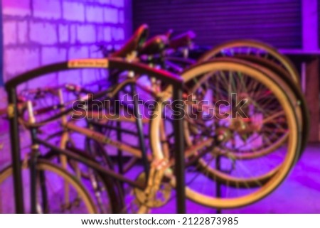 Defocused Bike parking within the market for safety  Royalty-Free Stock Photo #2122873985